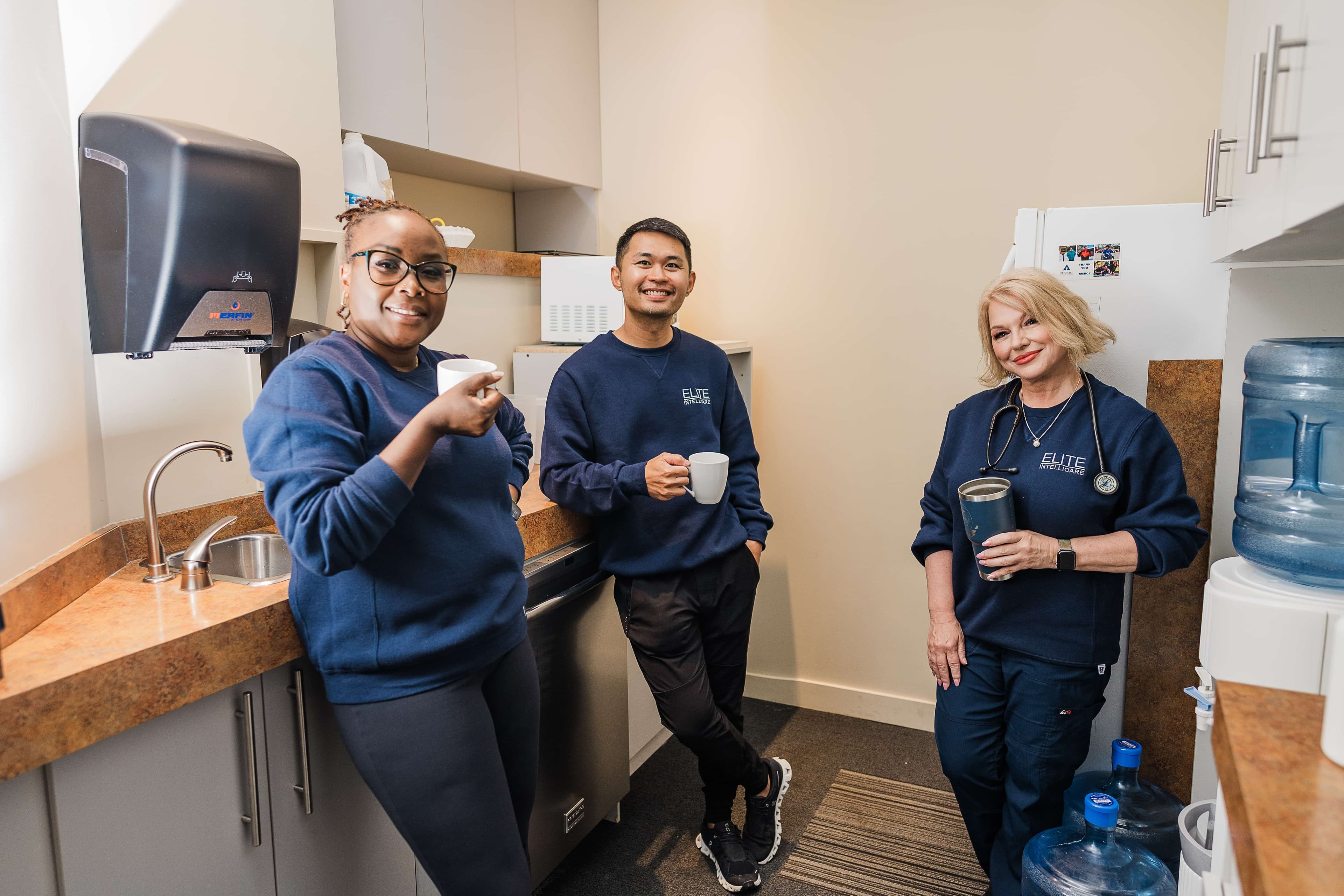 Photo of Elite Staff enjoying coffee